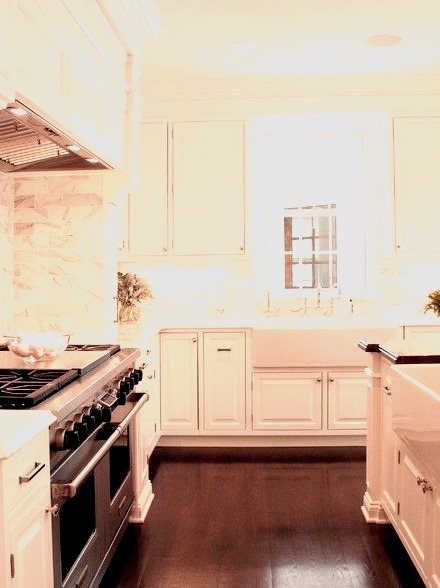 Elegant White Kitchen Utilizes Textures For Dimension